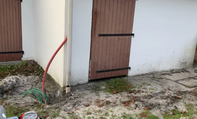 Réalisation tranchée sur 20 m coté garage